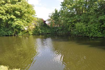 A widening of the canal in a semi-circle layout